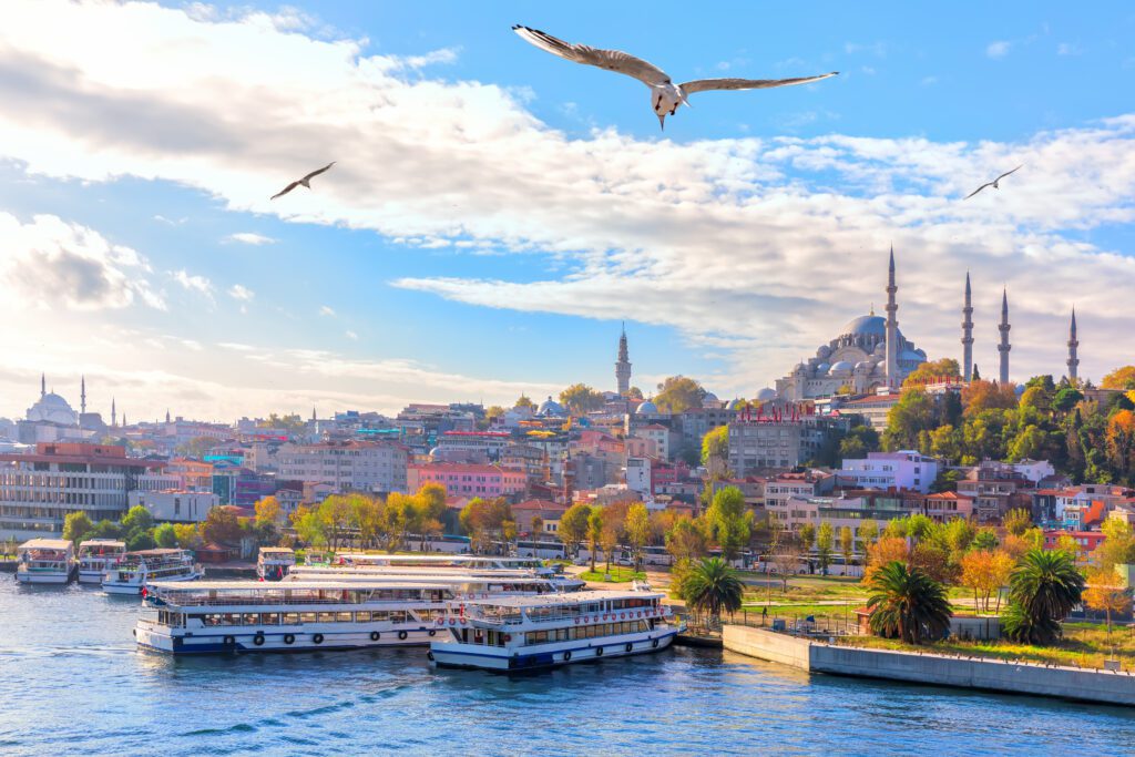 Süleymaniye Mosque: Ottoman Magnificence. Eminonu pier and the Suleymaniye Mosque in Istanbul, Turkey. Top tourist attractions in Istanbul
