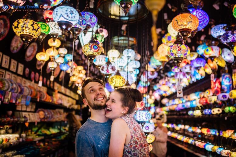 Couple embracing each other under turkish lights